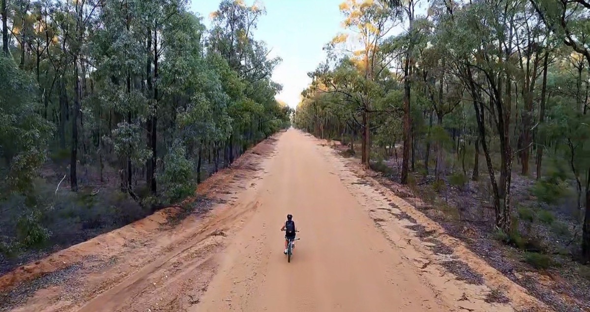 Jake riding the endless red dirt roads of Dubbo, NSW