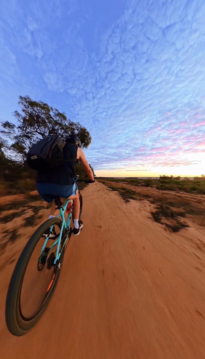 Jake chasing sunset on the red dirt, outback NSW