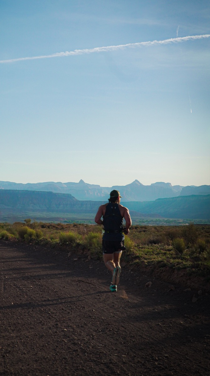 Trevor running toward Zion's open landscape