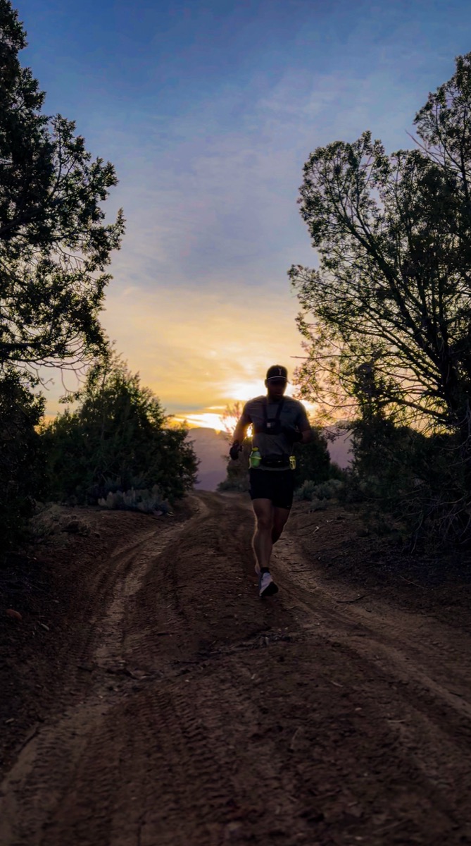 Trevor running the trails above Virgin at sunset